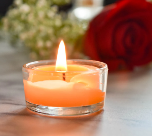 Tea light in glass jar